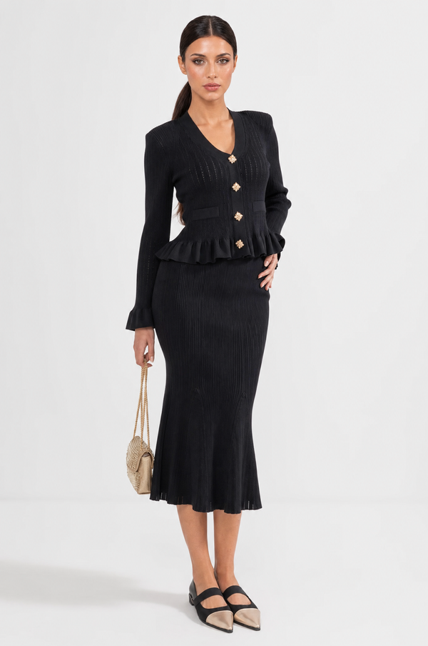 CONJUNTO DE CHAQUETA Y FALDA DE PUNTO CON VOLANTES - NEGRO