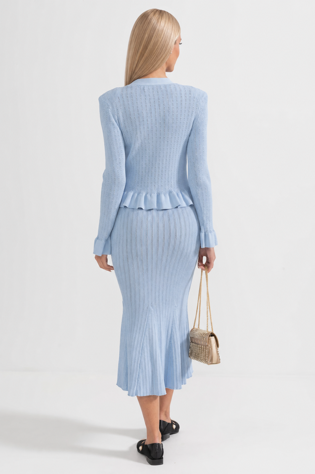 CONJUNTO DE CHAQUETA Y FALDA DE PUNTO CON VOLANTES - AZUL BEBÉ