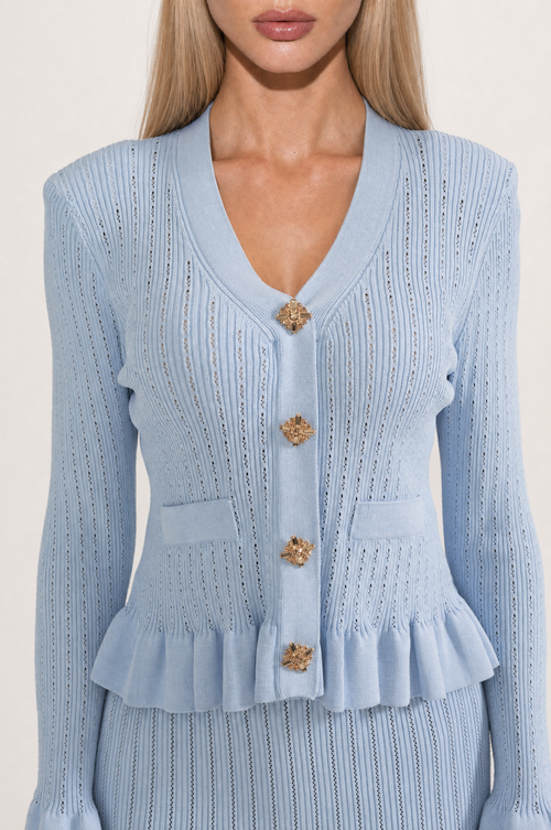 CONJUNTO DE CHAQUETA Y FALDA DE PUNTO CON VOLANTES - AZUL BEBÉ