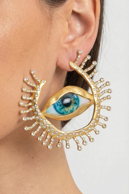 PENDIENTES DE BOTÓN CON OJO Y RAYOS DE CRISTAL - ORO