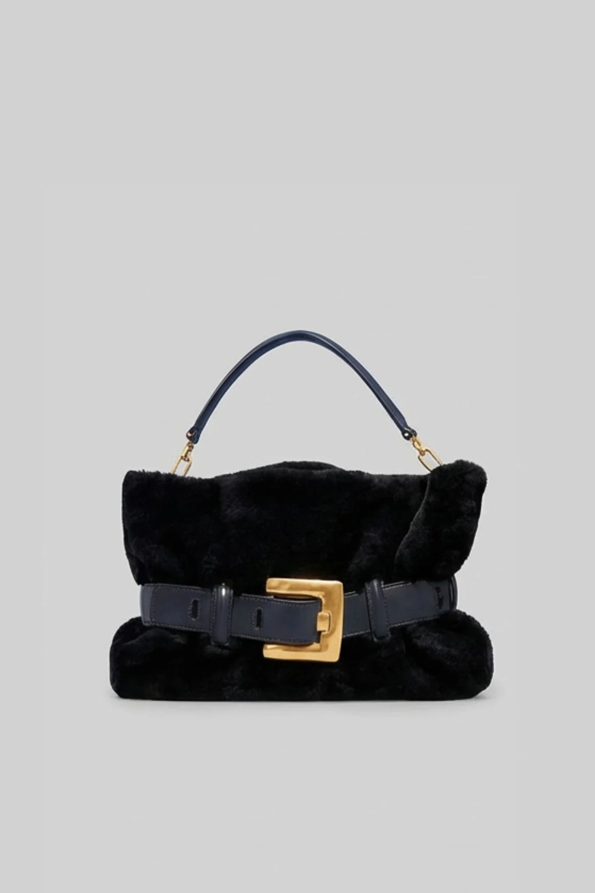 BOLSO DE MANO CON PELO SINTÉTICO Y HEBILLA DECORATIVA - NEGRO