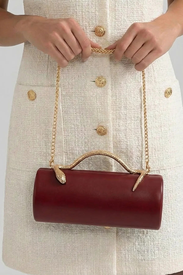 BOLSO DE MANO ESTRUCTURADO CON ASA DE SERPIENTE Y CADENA DORADA - GRANATE