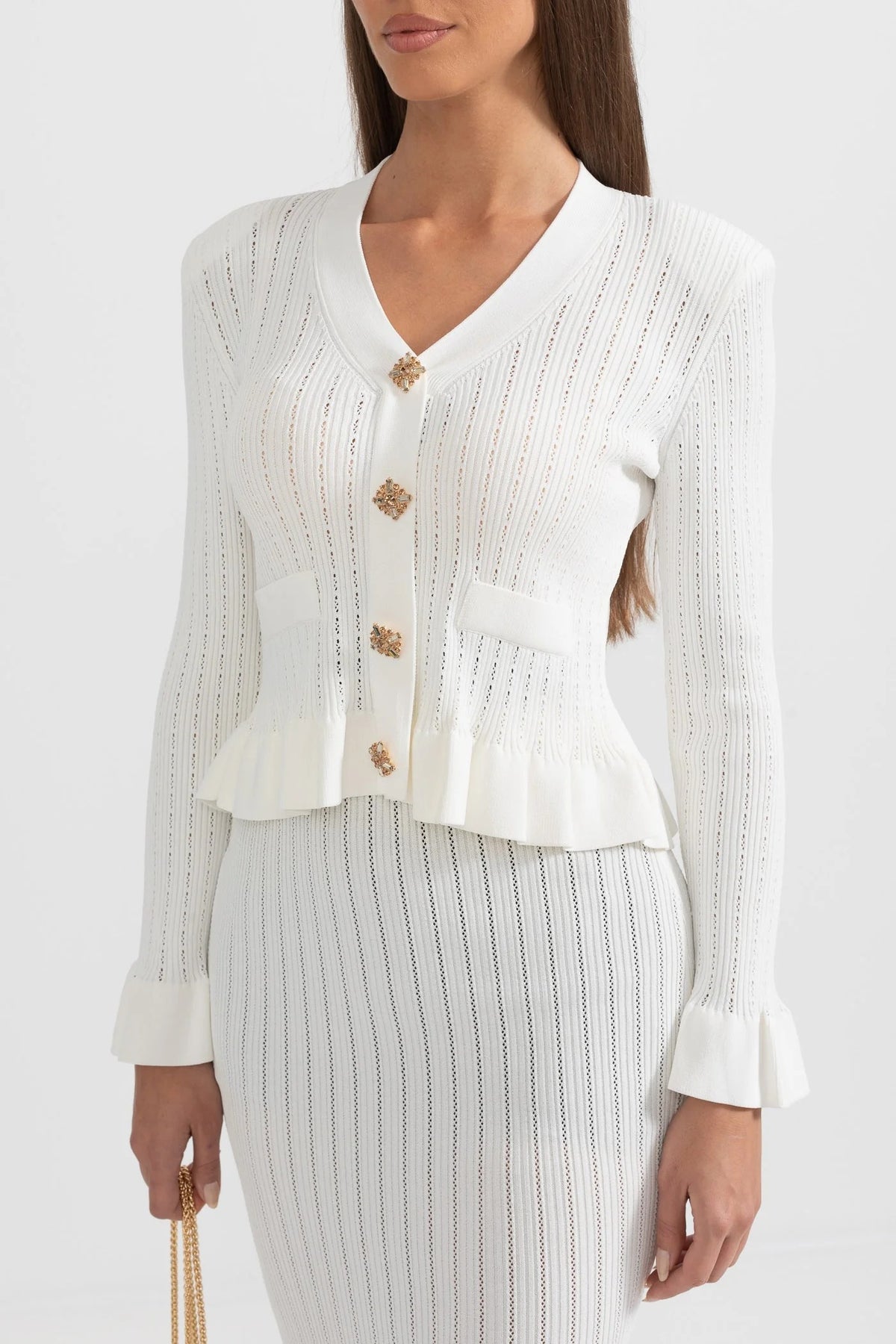 CONJUNTO DE CHAQUETA Y FALDA DE PUNTO CON VOLANTES - BLANCO