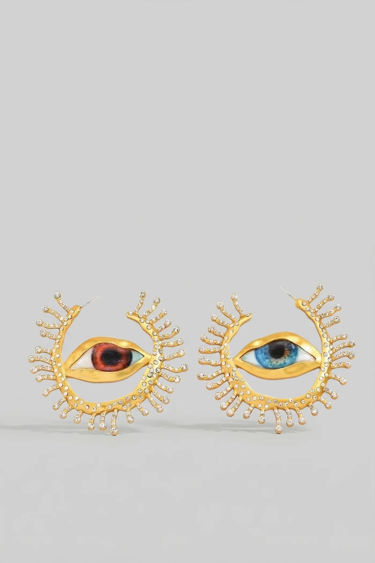 PENDIENTES DE BOTÓN CON OJO Y RAYOS DE CRISTAL - ORO